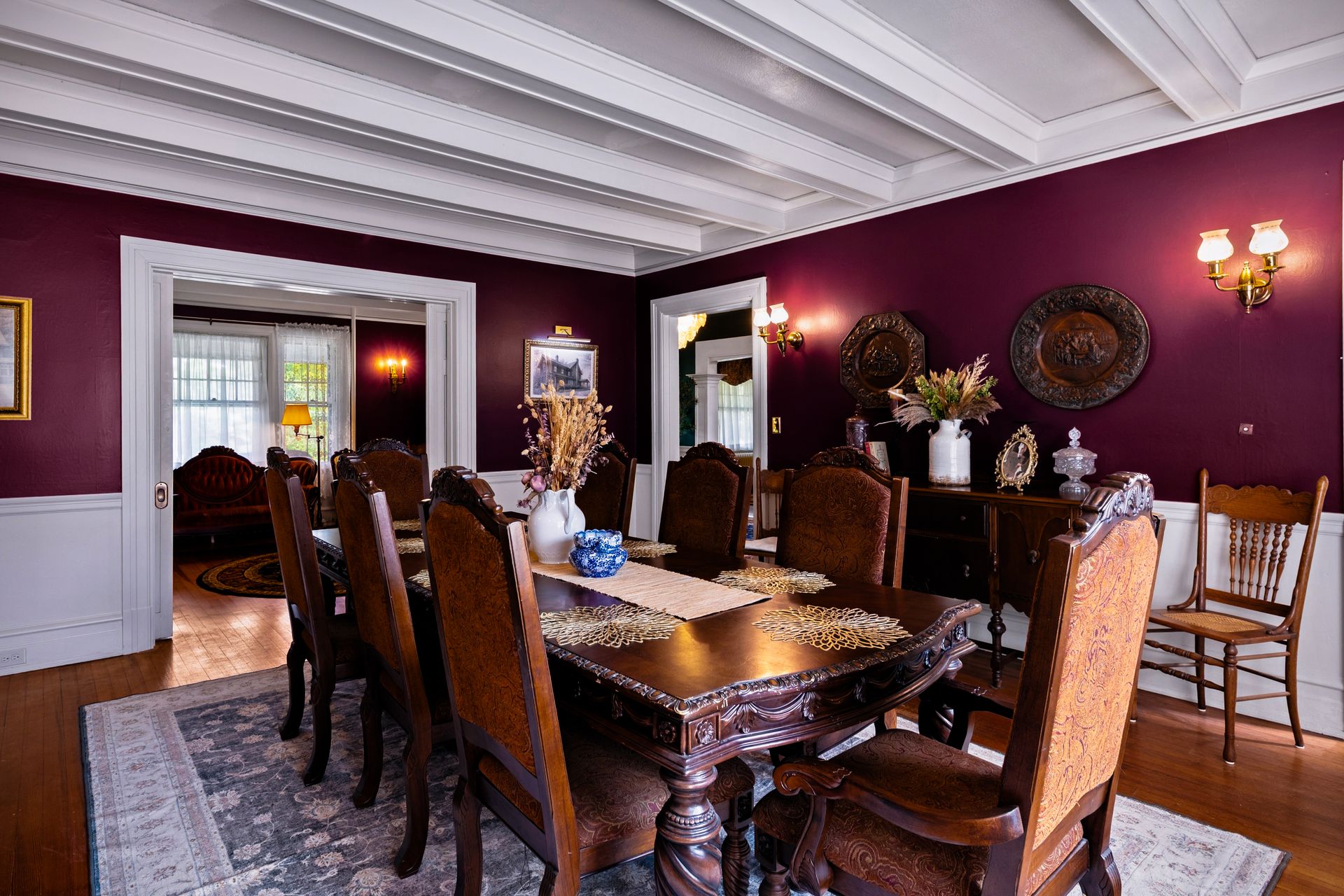 Formal dining room with carved antique table